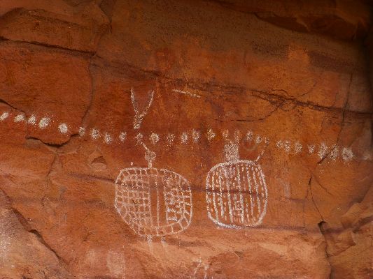 Movie of the Peek-a-Boo Panel, Needles District (no trip report) - 16 mb;  Ancestral Puebloan era figures
are painted over older (4000 years ago) Archaic red figures